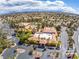Stunning aerial view of the community featuring lush landscaping, a sparkling pool, and well-maintained facilities at 2740 Billy Casper Dr, Las Vegas, NV 89134