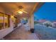 Covered patio overlooking meticulously manicured backyard at 2740 Billy Casper Dr, Las Vegas, NV 89134