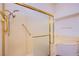 Bright bathroom featuring a glass shower with gold trim and a built-in jacuzzi tub at 2740 Billy Casper Dr, Las Vegas, NV 89134