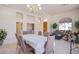 The large dining area features high ceilings, a chandelier, and easy access to other living spaces at 2740 Billy Casper Dr, Las Vegas, NV 89134