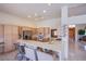 Bright kitchen boasts ample counter space, wood cabinets, and stainless steel appliances, adjacent to the entryway at 2740 Billy Casper Dr, Las Vegas, NV 89134