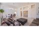 Spacious living and dining areas are open and bright, with neutral tile and large windows at 2740 Billy Casper Dr, Las Vegas, NV 89134