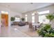 Inviting living space with a tiled entry, plush seating, and multiple windows for natural light at 2740 Billy Casper Dr, Las Vegas, NV 89134