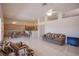 Inviting open-concept living space with tile flooring, perfect for both relaxing and entertaining guests at 2740 Billy Casper Dr, Las Vegas, NV 89134