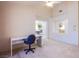 Office space with built-in desk and views of the dining area and kitchen, ideal for multitasking at 2740 Billy Casper Dr, Las Vegas, NV 89134