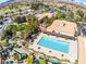 Aerial shot of the community pool and recreation area with neatly trimmed miniature golf course at 2740 Billy Casper Dr, Las Vegas, NV 89134