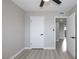 Bright bedroom features new floors, new doors, and white trim throughout at 2905 Dogwood Ct, North Las Vegas, NV 89030