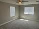 Bedroom featuring plush carpet, neutral walls, and a ceiling fan at 3016 Mount Charleston Dr, Pahrump, NV 89048