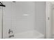 Bathroom showing a bathtub and white tile at 3124 Glenhurst Dr, Las Vegas, NV 89121