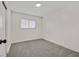 Bedroom with a window and neutral carpeting at 3124 Glenhurst Dr, Las Vegas, NV 89121