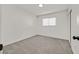 Bedroom featuring neutral carpeting and a bright window at 3124 Glenhurst Dr, Las Vegas, NV 89121