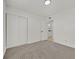 Bright bedroom featuring neutral carpeting with a large closet at 3124 Glenhurst Dr, Las Vegas, NV 89121