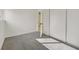 Bedroom with gray carpeting, white walls, and a sliding closet door at 3124 Glenhurst Dr, Las Vegas, NV 89121