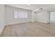 Bright bedroom with modern light-colored flooring and neutral walls at 3124 Glenhurst Dr, Las Vegas, NV 89121