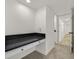 Desk area with a black countertop and carpet flooring at 3124 Glenhurst Dr, Las Vegas, NV 89121