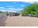 Charming single-story home featuring neutral paint, low maintenance gravel landscaping, and a covered porch at 3124 Glenhurst Dr, Las Vegas, NV 89121
