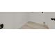 Picture of a compact laundry area with laminate flooring and white walls at 3124 Glenhurst Dr, Las Vegas, NV 89121