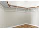 Spacious walk-in closet features laminate flooring and plenty of storage space at 3676 Renovah St # 102, Las Vegas, NV 89129