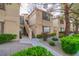 Condominium exterior features a well-maintained facade, landscaping, and visible unit numbers at 3676 Renovah St # 102, Las Vegas, NV 89129