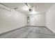 Spacious two car garage features concrete flooring and water heater at 3676 Renovah St # 102, Las Vegas, NV 89129