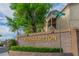 Elegant Sunhampton community entrance sign is set amongst lush landscaping at 3676 Renovah St # 102, Las Vegas, NV 89129