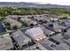 Aerial view of homes with a patio shade cover highlighting a desirable residential neighborhood at 3846 W Neal Ave, Las Vegas, NV 89141