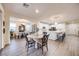 Elegant dining room featuring a modern table, stylish decor, and ample natural light at 3846 W Neal Ave, Las Vegas, NV 89141