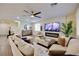 Inviting living room featuring a modern fireplace, comfortable seating, and stylish decor at 3846 W Neal Ave, Las Vegas, NV 89141