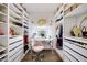 Custom walk-in closet with vanity, drawers and ample storage space at 3846 W Neal Ave, Las Vegas, NV 89141