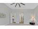 Spacious primary bedroom with plush carpet and access to the en-suite bathroom and walk-in closet at 3870 Valles Caldera Ct, Las Vegas, NV 89118