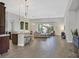 Spacious open concept features sleek kitchen, dining area and comfortable seating at 3870 Valles Caldera Ct, Las Vegas, NV 89118
