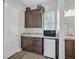 The well-appointed wet bar features a granite countertop, and a mini fridge for effortless entertaining at 3870 Valles Caldera Ct, Las Vegas, NV 89118