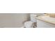 Bathroom with a white sink, white toilet, and cream walls at 3953 Rebecca Raiter Ave # 101, Las Vegas, NV 89110
