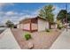 Street view of the exterior with security gate and desert landscaping at 441 N Lamb Blvd # E, Las Vegas, NV 89110