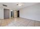 Neutral living room offering ample space and tile floors for easy upkeep at 441 N Lamb Blvd # E, Las Vegas, NV 89110
