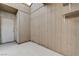 Enclosed patio featuring neutral-colored walls, a door and overhead natural light at 441 N Lamb Blvd # E, Las Vegas, NV 89110