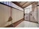 Patio featuring an exterior gate to outdoor space and broom for upkeep at 441 N Lamb Blvd # E, Las Vegas, NV 89110