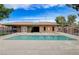 Enjoy a sunny day at this refreshing community pool surrounded by a fence at 441 N Lamb Blvd # E, Las Vegas, NV 89110