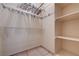Well-organized walk-in closet features ample storage space and custom shelving for easy organization at 441 N Lamb Blvd # E, Las Vegas, NV 89110