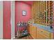 Stylish bar area with a wine rack, custom cabinets, and a curated selection of spirits at 4432 Vicobello Ave, Las Vegas, NV 89141