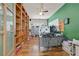 Home office featuring a large desk, built-in shelves, and plenty of natural light at 4432 Vicobello Ave, Las Vegas, NV 89141