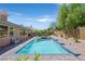 Backyard boasts a refreshing swimming pool, elevated hot tub, and ample patio seating area at 4432 Vicobello Ave, Las Vegas, NV 89141