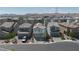 New construction homes boast modern design and solar panels in a vibrant, Gathering-friendly neighborhood with mountain views at 4707 Pink Jasper Ct, Las Vegas, NV 89141