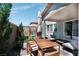 Relaxing backyard with patio area, dining table, and lounge seating perfect for entertaining or enjoying quiet moments at 4707 Pink Jasper Ct, Las Vegas, NV 89141