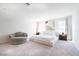 Bright bedroom with a comfortable bed and modern décor, creating a relaxing retreat at 4707 Pink Jasper Ct, Las Vegas, NV 89141