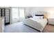 Serene bedroom with a cozy bed, desk area, and soft natural light, perfect for relaxation at 4707 Pink Jasper Ct, Las Vegas, NV 89141
