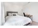 Serene bedroom with a soft bed, workspace, and natural light, ideal for relaxation and study at 4707 Pink Jasper Ct, Las Vegas, NV 89141