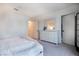Comfortable bedroom showcasing a dresser, mirror, and neutral tones, offering a calm space at 4707 Pink Jasper Ct, Las Vegas, NV 89141