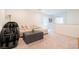 Comfortable upstairs bonus room featuring plush carpet and comfortable seating at 4707 Pink Jasper Ct, Las Vegas, NV 89141