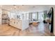 Open concept living space with a kitchen island, stainless steel appliances and modern, neutral decor at 4707 Pink Jasper Ct, Las Vegas, NV 89141